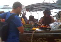 Boats selling food and drink on Pranang Cave Beach